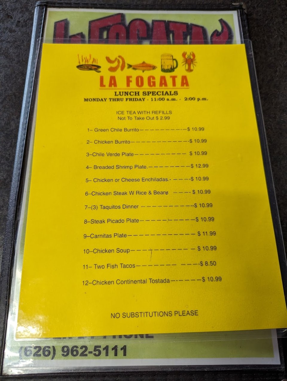 Printed menu showing margaritas and beers.