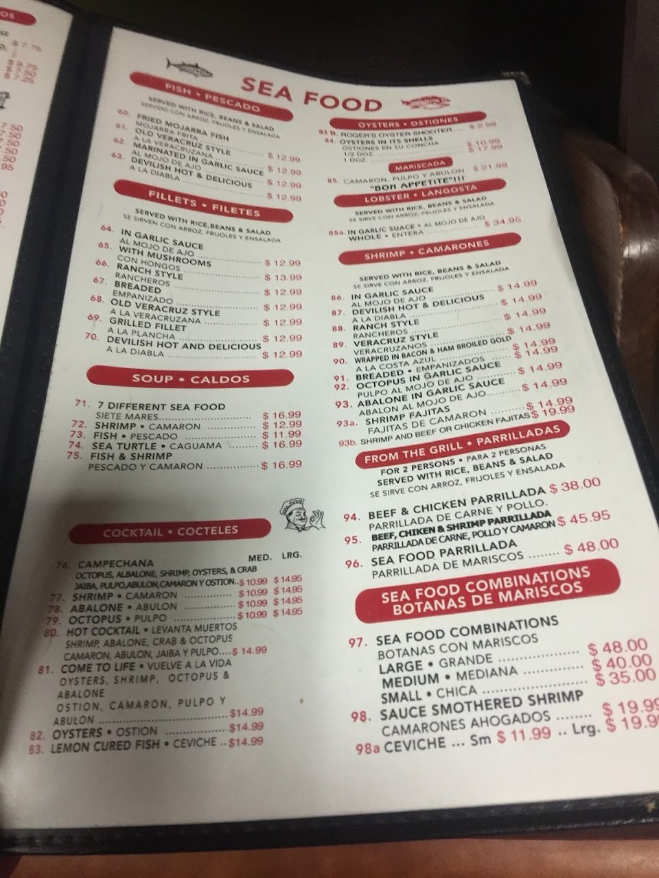Food and beverage menu with Spanish headings.